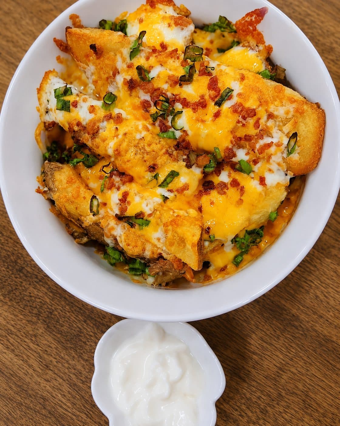 Baked with Mixed Cheese, green onion, Bacon and serve with Sour Cream